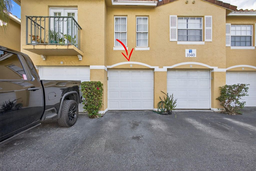 Photo of 1040 Lake Shore Dr #203, Lake Park, FL 33403 (MLS # F10541116)