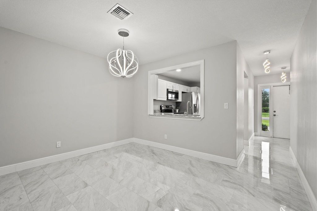 Photo of 5842 Moss Court #9, Fort Pierce, FL 34982 (MLS # R11131533)