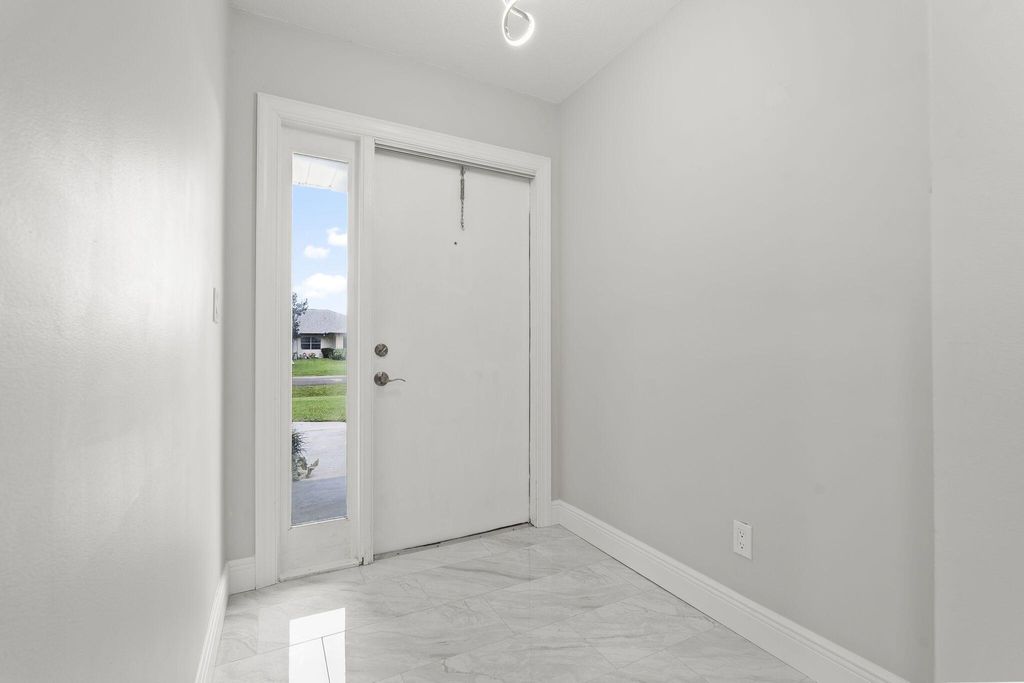 Photo of 5842 Moss Court #9, Fort Pierce, FL 34982 (MLS # R11131533)