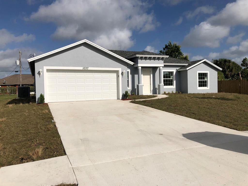 Photo of 2133 SW Chestnut Lane, Port Saint Lucie, FL 34953 (MLS # R10702132)