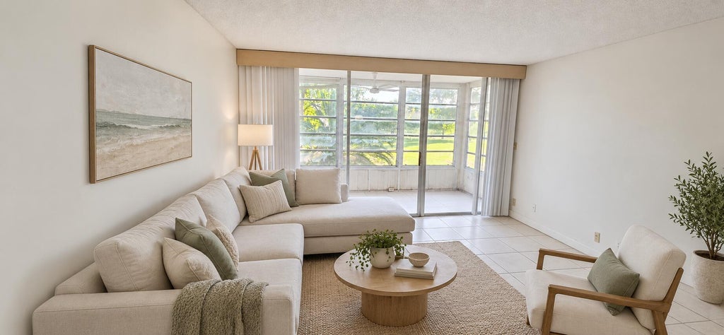 Photo of 8320 SANDS POINT Boulevard #M207, Tamarac, FL 33321 (MLS # B26073280)