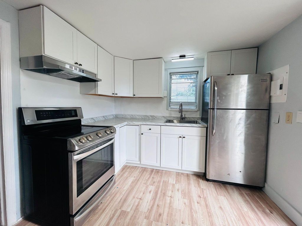 Photo of 3901 Lakewood Road #A, Palm Springs, FL 33461 (MLS # B26030596)