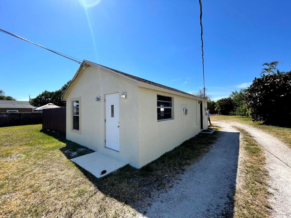 Photo of 3901 Lakewood Road #A, Palm Springs, FL 33461 (MLS # B26030596)