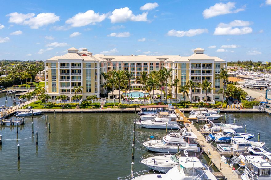 Your view of the water and boat-filled docks on the intercoastal from the soaring 9 foot floor-to-ceiling windows in this renovated unit can be your paradise!  This beautiful 2005 Key West inspired building is your Florida dream.  Freshly painted and tiled, this split-plan model offers 2 large walk-in closets in both bedrooms, extra storage in the kitchen and 2 linen closets.  Washer and dryer in unit with extra shelving.  All windows and doors are impact.  The kitchen provides ample storage and top line appliances. Ameities include secure indoor parking, valet service, 24-hour staffed security, optional marina and boat club, 2 pools, state of the art fitness center, clubhouse and cafe. A bridge away from Hypoluxo Beach and Manalapan.  Stay on vacation when you call this home!