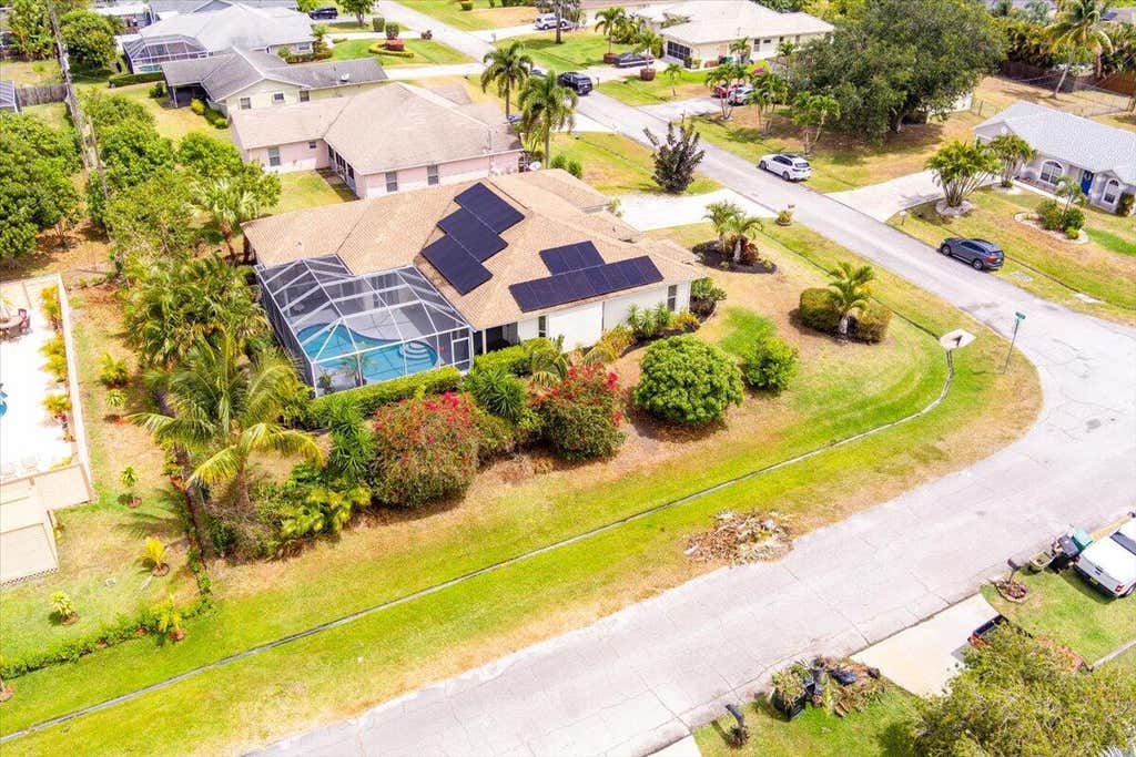 Photo of 3210 SE Otis Lane, Port Saint Lucie, FL 34984 (MLS # R10983180)
