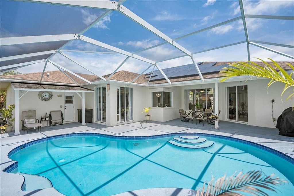 Photo of 3210 SE Otis Lane, Port Saint Lucie, FL 34984 (MLS # R10983180)