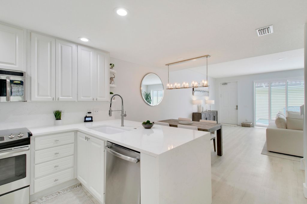 Photo of 115 Rivinia Drive, Jupiter, FL 33458 (MLS # R10959326)