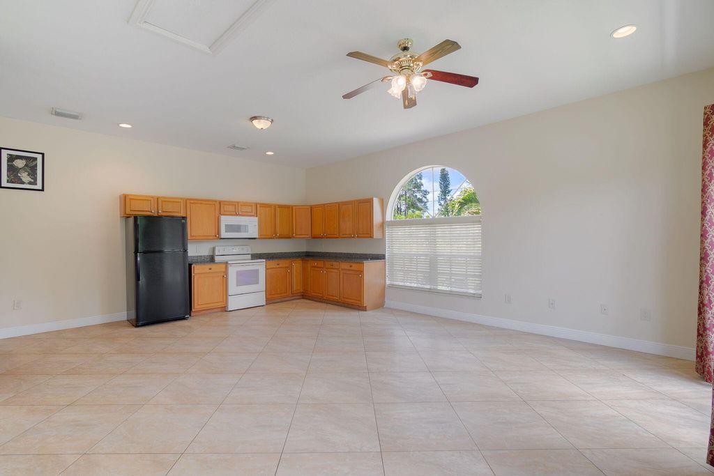 Photo of 12094 Citrus Grove Boulevard, West Palm Beach, FL 33412 (MLS # B26006022)