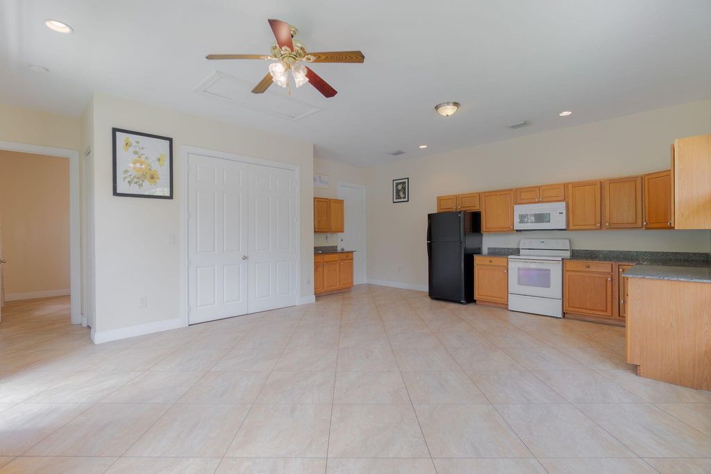 Photo of 12094 Citrus Grove Boulevard, West Palm Beach, FL 33412 (MLS # B26006022)