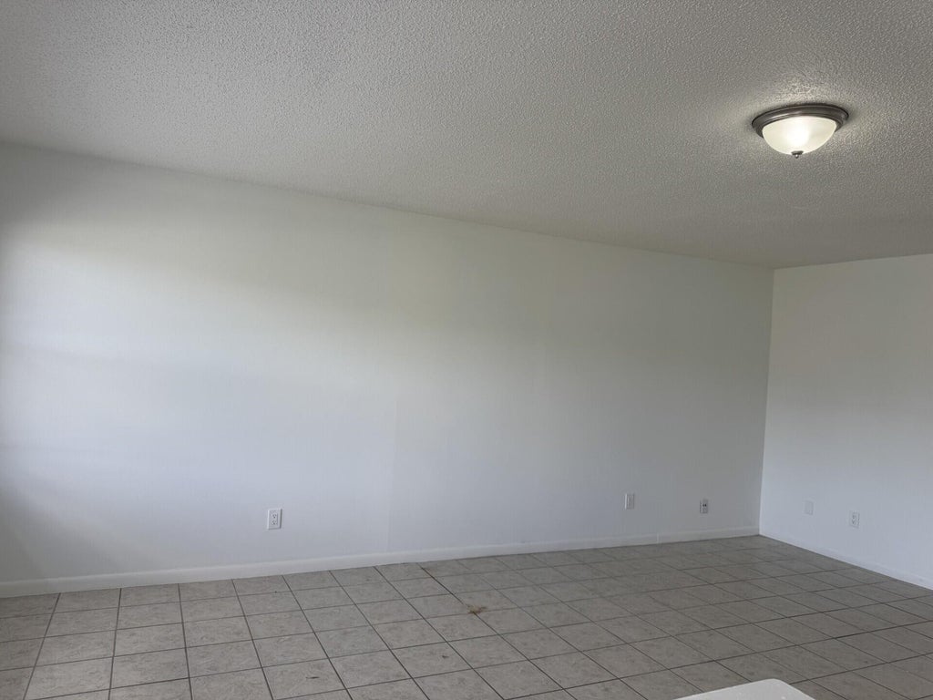 Photo of 710 NW Airoso Boulevard, Port Saint Lucie, FL 34983 (MLS # B26005965)