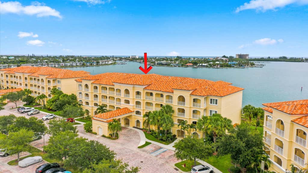 Photo of 21 HARBOUR ISLE Drive W #302, Fort Pierce, FL 34949 (MLS # B26060234)