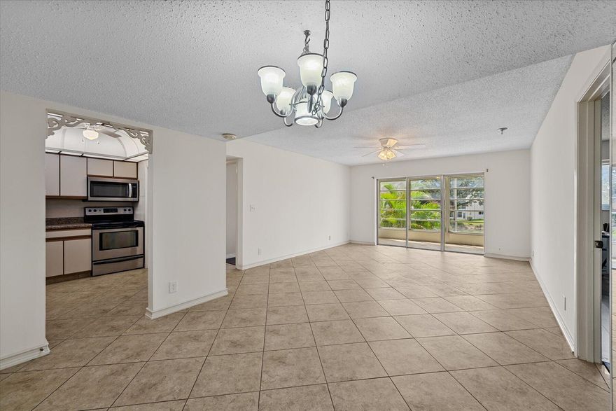 Charming two-bedroom, two-bathroom condo nestled in an ALLl-AGE building in Palm Springs, FL. This meticulously maintained unit boasts tile and vinyl flooring throughout, providing durability and style. Enjoy the peace of mind provided by impact windows while taking in the serene lakefront views with a beautiful fountain. Step outside onto the tiled patio to savor the outdoors. Also features a band new water heater. With convenient proximity to shopping, beaches, downtown West Palm Beach, Worth Avenue, and Palm Beach International Airport, this condo offers both comfort and accessibility for your Florida lifestyle.