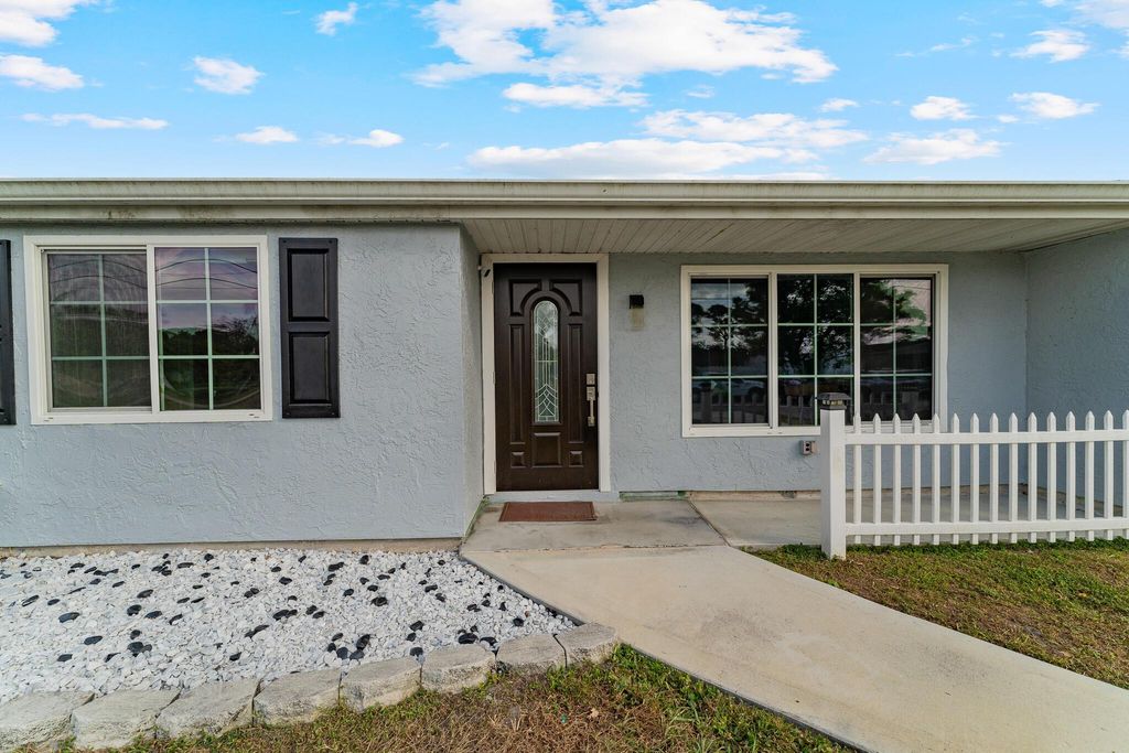 Photo of 2161 SE Aneci Street, Port Saint Lucie, FL 34984 (MLS # R11088414)