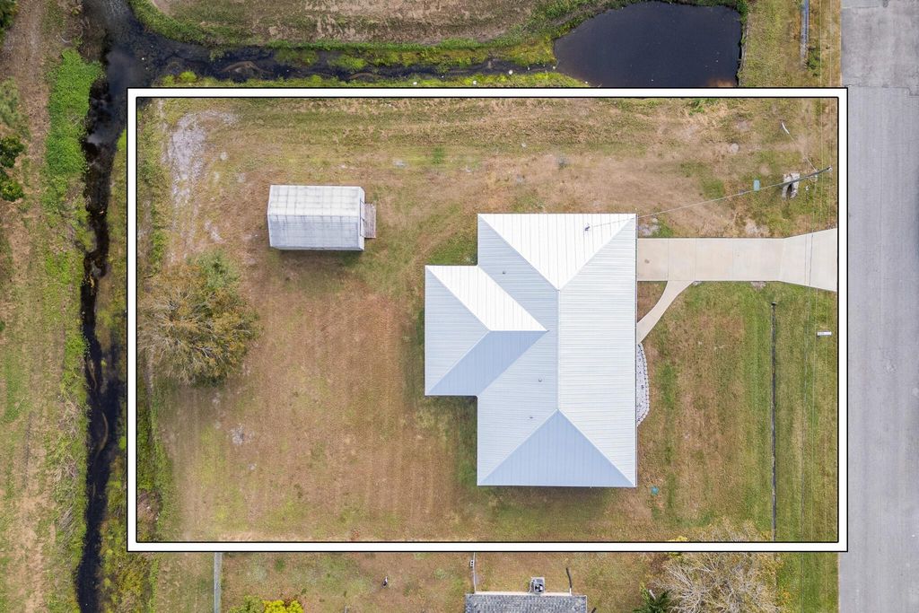 Photo of 2161 SE Aneci Street, Port Saint Lucie, FL 34984 (MLS # R11088414)