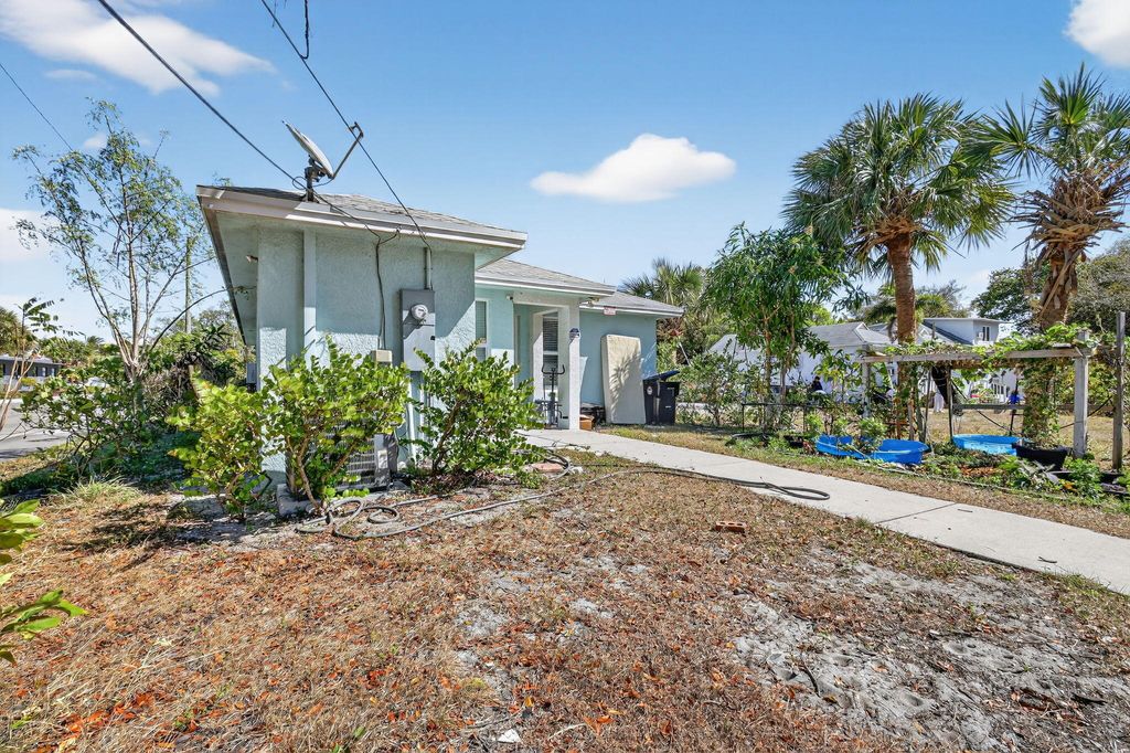 Photo of 231 N H Street, Lake Worth Beach, FL 33460 (MLS # B26005775)