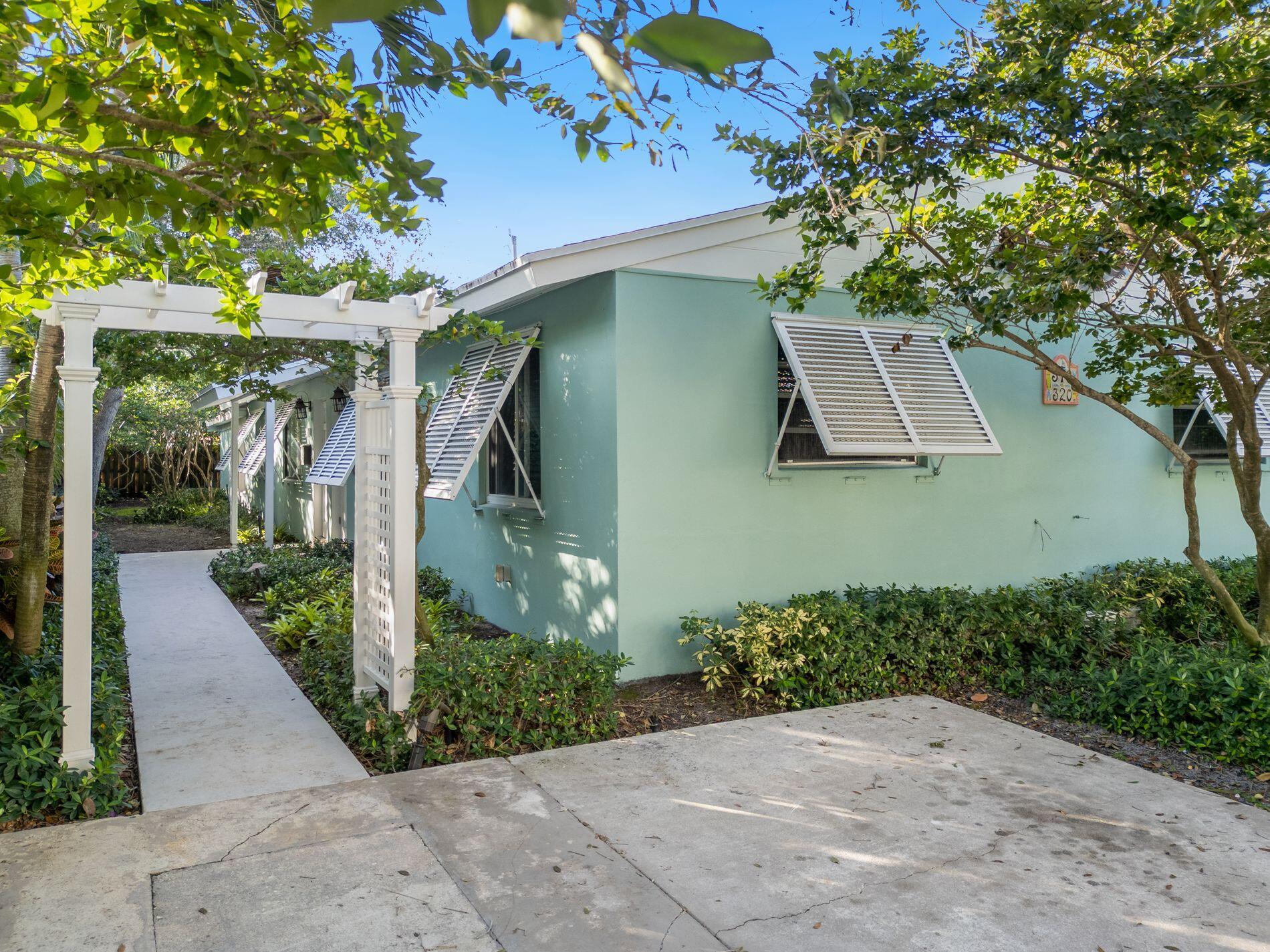 Absolutely fantastic 2 bedroom 1 Bath unit with extra space that is an ideal den/home office. Amazing kitchen with solid surface countertops, stainless steel appliances and wood and glass cabinetry. Beautiful built in wall unit adds the the ambiance of the unit and provides ample storage. Shared laundry room and peaceful common area backyard patio space. This unit is located just blocks away from vibrant Atlantic Avenue and Pineapple Grove shops and restaurants. Wont Last!