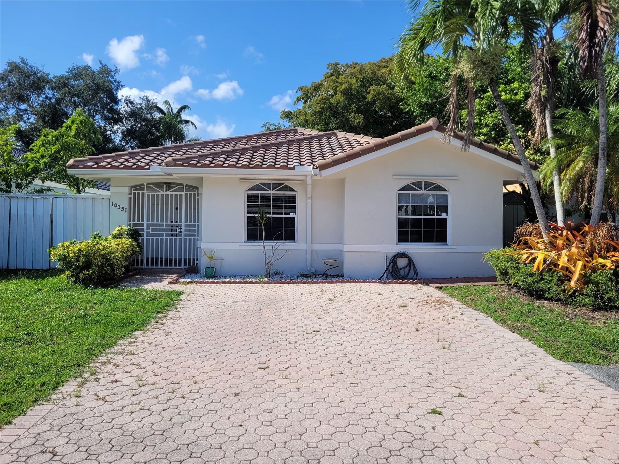 Located in a highly desirable gated community near Florida International University, this 3-bedroom, 2-bathroom home offers modern comfort, convenience, and a great location. With quick access to the Turnpike and Palmetto Expressways, getting around is easy. The property is in excellent, move-in-ready condition and features updated amenities and finishes. Enjoy the privacy and security of gated living, close to essential services and top-rated schools. A rare opportunity in a sought-after neighborhood.