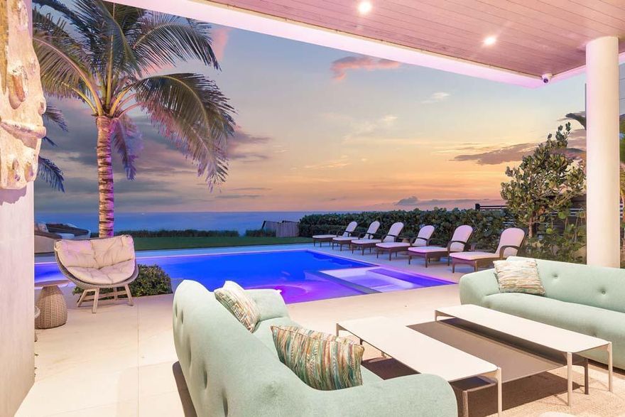 Spectacular oceanfront estate meets modern luxury. This trophy property is newly constructed and designed to invite the seaside experience in while showcasing inspirational pieces from all over the world including Italy, France, and Africa. The resort-style residence offers breathtaking ocean views throughout; multiple living areas; 5 bedrooms; 6 full and 4 half baths; upper-level lounge with full bar; and expansive terraces. The tropical outdoor oasis features private beach access; outdoor kitchen; pool with spa; and manicured landscape. Luxury amenities include full gym; 5-car garage; motorized privacy gate; Crestron sound and lighting system through; and more. This luxurious residence was developed by respected team of Seadar Builders; Randall Stofft Architects; and Sola Interiors.