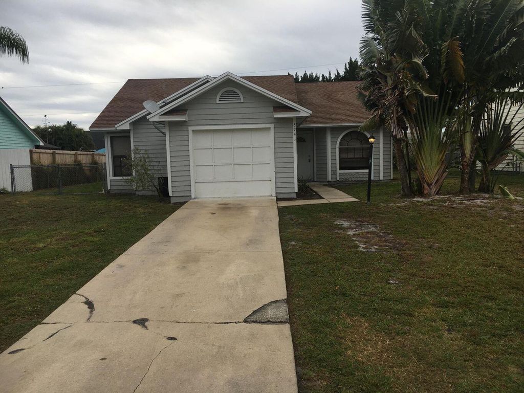 Photo of 5941 SE Tangerine Boulevard, Stuart, FL 34997 (MLS # R10819640)