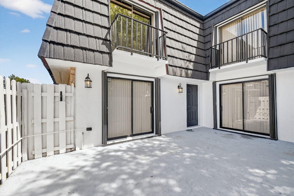 Photo of 320 Woodland Road, Palm Springs, FL 33461 (MLS # B26045284)