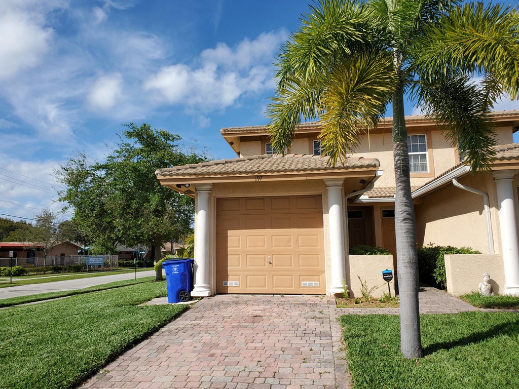 Photo of 197 NW Eller Street, Deerfield Beach, FL 33441 (MLS # R10796114)