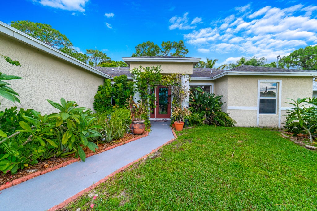 Photo of 245 SW De Gouvea Terrace, Port Saint Lucie, FL 34984 (MLS # B26076263)
