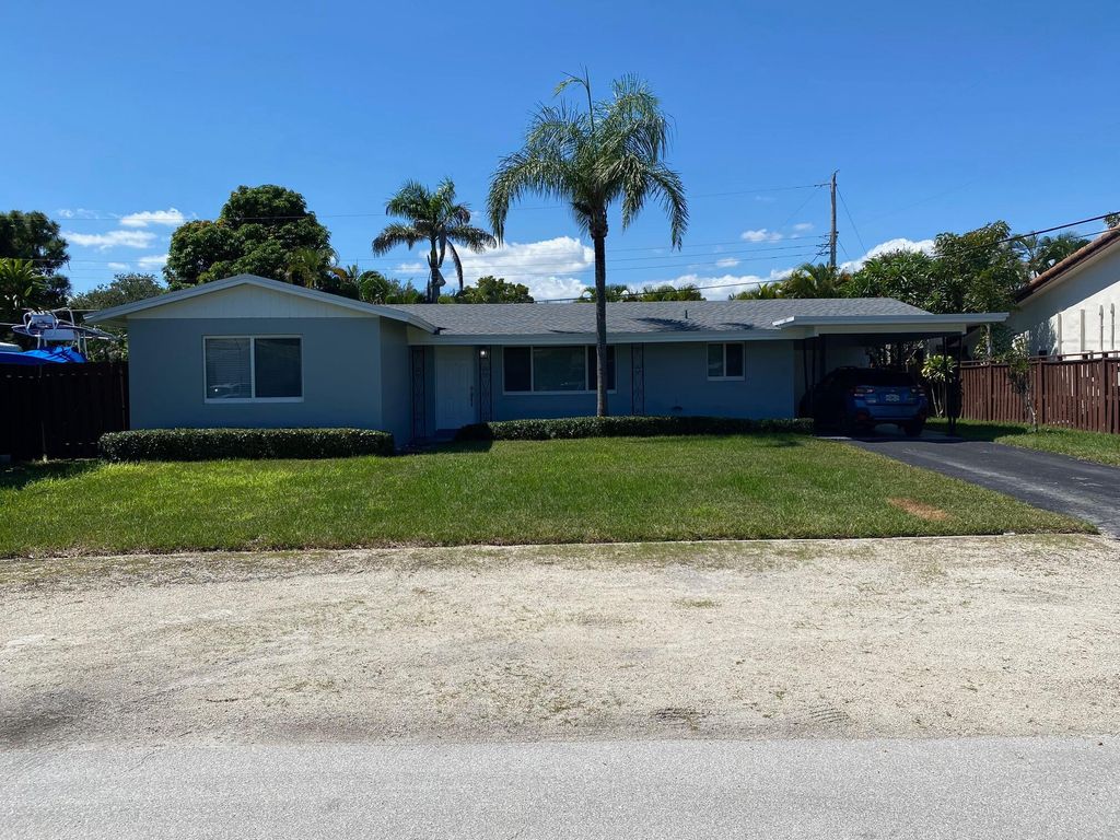 Photo of 2751 NE 26th Terrace, Boca Raton, FL 33431 (MLS # B26008837)