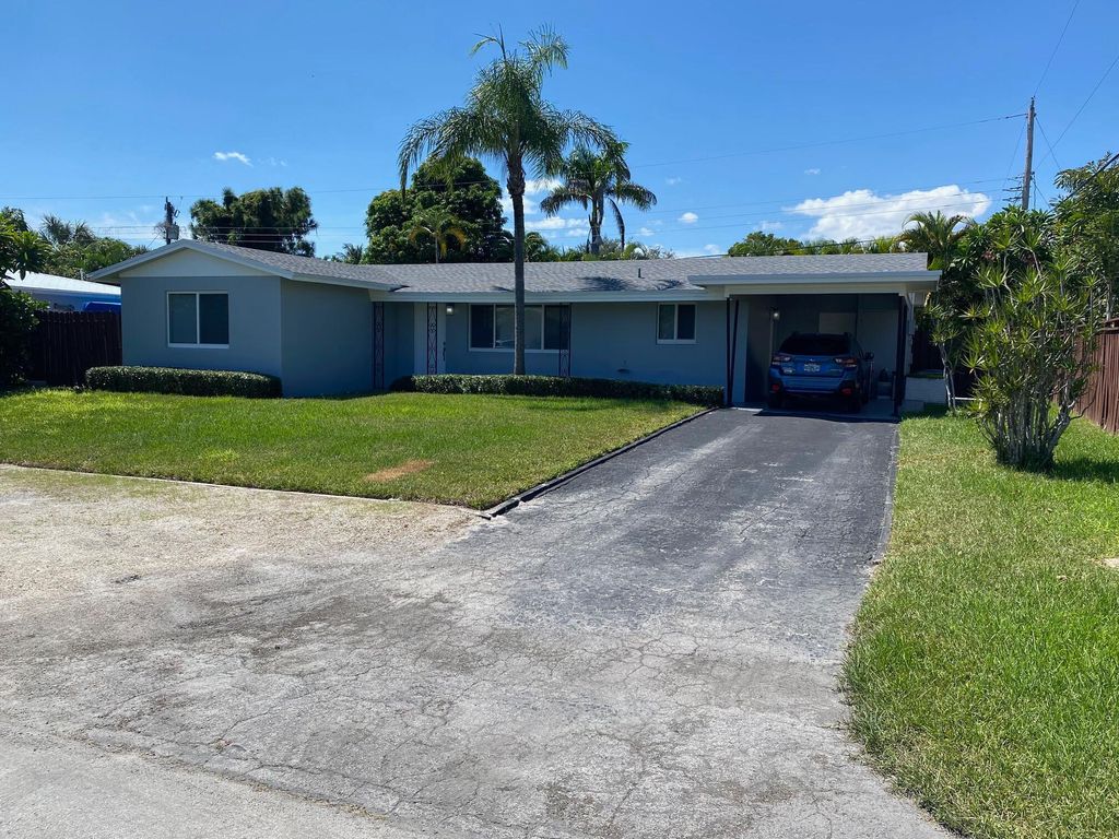 Photo of 2751 NE 26th Terrace, Boca Raton, FL 33431 (MLS # B26008837)