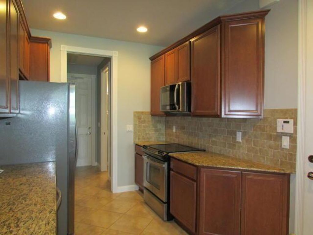 Photo of 3306 W Mallory Boulevard, Jupiter, FL 33458 (MLS # R10764676)