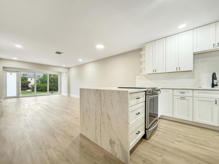 This fully renovated condo was completed in March 2026. This is a true move-in-ready home with modern finishes & quality craftsmanship throughout.  Key Features & Upgrades:    • Full hurricane impact windows & doors 2026  • Marble countertops w/ "waterfall" in the kitchen    • AC from 2021  • Water Heater 2018   • No popcorn ceilings    • 6.5mm luxury vinyl plank flooring throughout    • Raised panel interior doors    • Full-size washer & dryer    • LED mirrors in updated bathrooms    • Building Insurance, Roof, Water Bill, Internet & Cable Included  Residents enjoy access to a brand-new clubhouse that opened on February 1, 2026  a must-see amenity that adds incredible value and lifestyle appeal.  Designed for low-maintenance living with all major updates already completed.