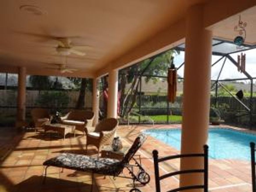 This property is located in a quiet neighborhood in the heart of Wellington. Marble floors throughout the main living areas and office and carpet in the 3 bedrooms, updated kitchen and mudroom. This is a true 3 bedroom with an additional office area, one of the bedrooms has a private entrance and screened porch. Oversized screened in patio with a large salt water pool with Solar panels and a fenced in grass yard for your pets. Owner is purchasing new beds for both guest rooms and a new couch for living area as well as replacing the carpet in the one bedroom.