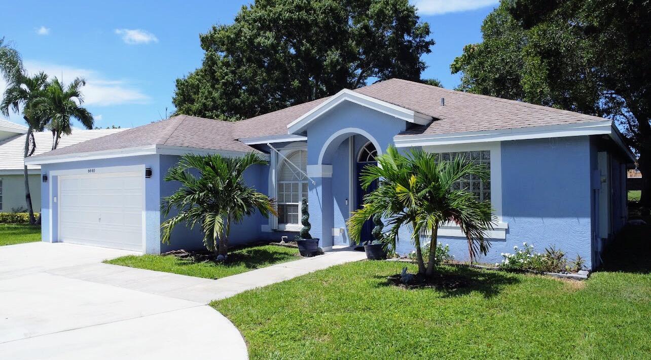 Come reside in one of the nicest neighborhoods in west Boynton Beach! Wonderful, family-oriented community with direct access to Crystal Lakes Elementary, allowing your children to safely walk or bike to school. This home offers an oversized lot on the lake with amazing views, new patio and tons of outdoor space, plenty big for a pool or batting cage! Inside is a split floor plan with 4 bedrooms and 2 full baths, 2 separate living spaces, separate dining space and updated, open concept kitchen with extra cabinets. Coffee/wet bar too! Owners have added a circular driveway to accommodate extra vehicles, removed the popcorn ceiling, added canless LED recessed lighting throughout, new closet doors, new baseboards, Nest WIFI thermostat and new cabinets in the laundry. Cont. for more info