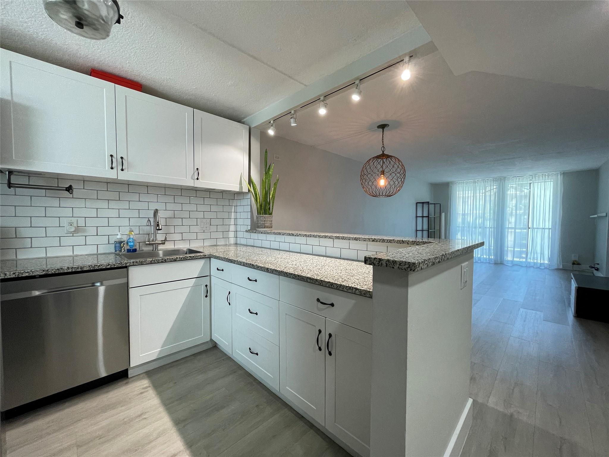 Spacious and completely renovated 2 bedroom/2 bath apartment in east Fort Lauderdale, walking distance to Lauderdale by The Sea beach, restaurants, shopping and hospitals. Great schools. Open kitchen with SS appliances, tankless water heater, filtered water system, impact windows, modern bathrooms, and designer's closets. Washer and dryer outside the unit entrance. Assigned parking spot with extras for guests. Amenities include: gym, heated pool and jacuzzi, gas BBQ area, lush tropical garden. Fiber optic cable, internet, water, and garbage are included in the rent. Move-in cost: first, last, and security deposit; 700 minimum credit score per association. No Pets. No smokers. No short term rentals.