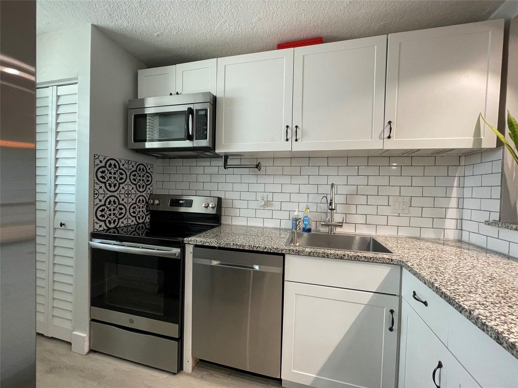 Photo of 5321 NE 24th Terrace #309A, Fort Lauderdale, FL 33308 (MLS # F10524570)