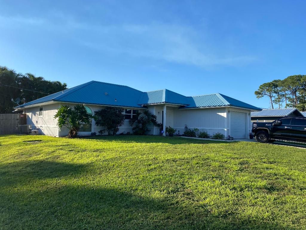 Photo of 3196 SW Areca Drive, Palm City, FL 34990 (MLS # R10958375)