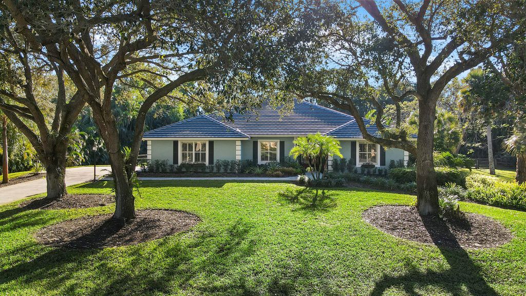 Photo of 5060 Misty Morn Road, Palm Beach Gardens, FL 33418 (MLS # R10858509)