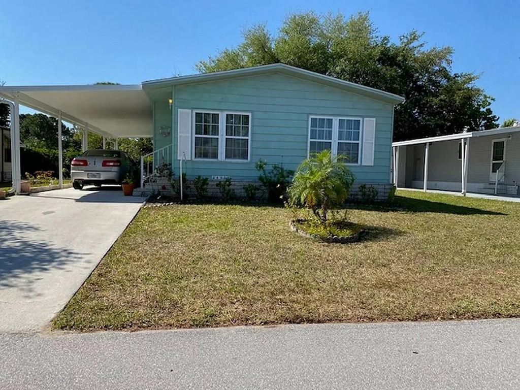 Photo of 14063 Cancun Avenue, Fort Pierce, FL 34951 (MLS # R10996256)