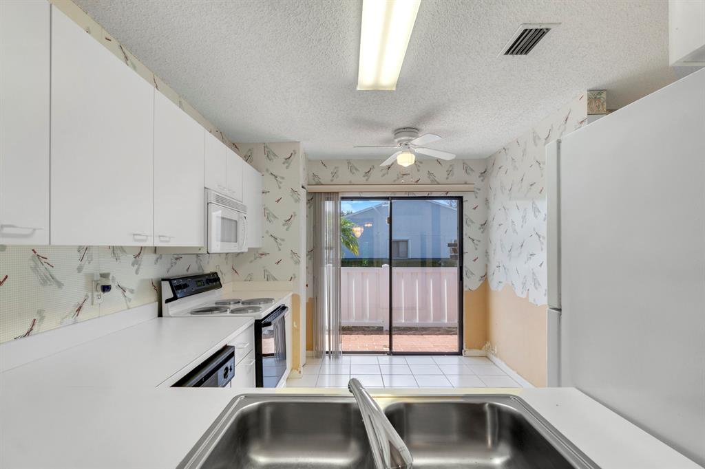 ARBOURS II OF THE PALM BEACHES CONDO - Residential