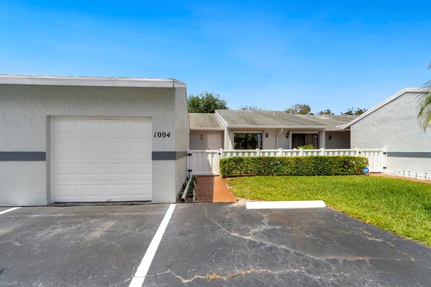 55 + Community.  2/2 with Garage, New A/C.  Unit has a wonderful Florida room, additional patio at the front.   Here you'll enjoy peace of mind with whole-house hurricane shutters. Galley-style kitchen includes plenty of cabinet and counter space.  The sunroom provides a bright, cheerful spot for additional seating or for a home office or hobby area.   Maintenance fees include water, cable, pool and exterior/roof.