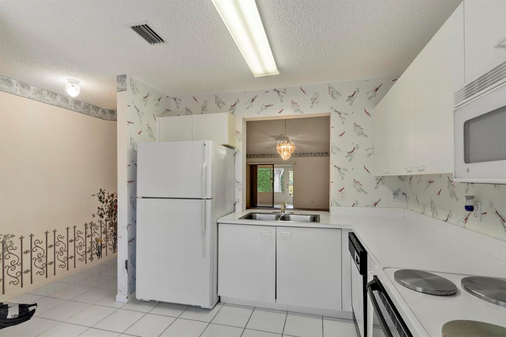 ARBOURS II OF THE PALM BEACHES CONDO - Residential