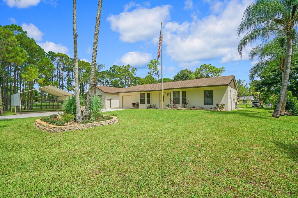 Photo of 14493 73rd St N, Loxahatchee, FL 33470 (MLS # R11009910)