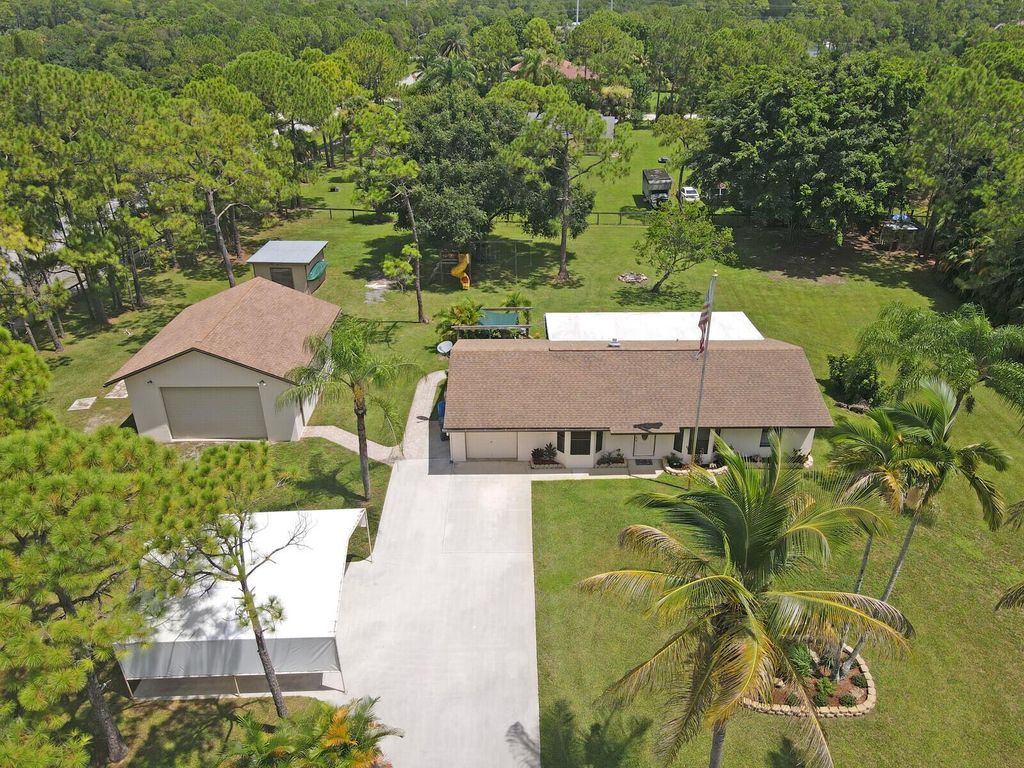 Photo of 14493 73rd St N, Loxahatchee, FL 33470 (MLS # R11009910)