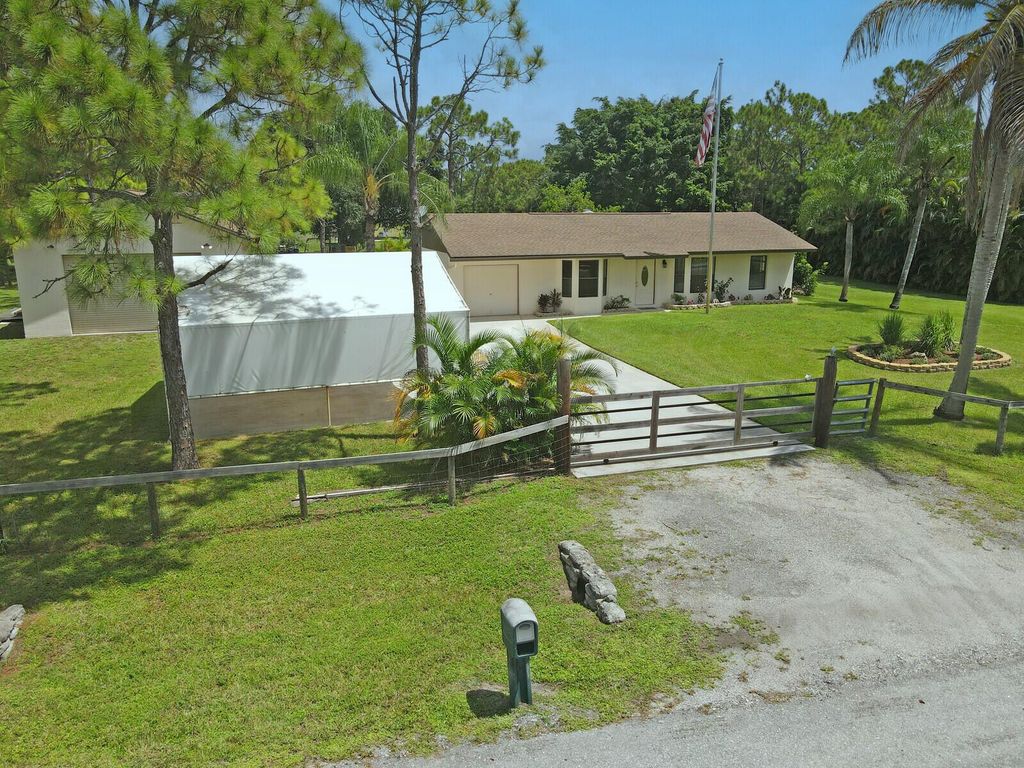 Photo of 14493 73rd St N, Loxahatchee, FL 33470 (MLS # R11009910)