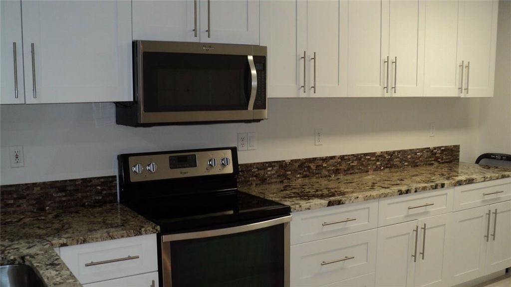 Photo of 440 NW 67th Street #H105, Boca Raton, FL 33487 (MLS # F10494598)