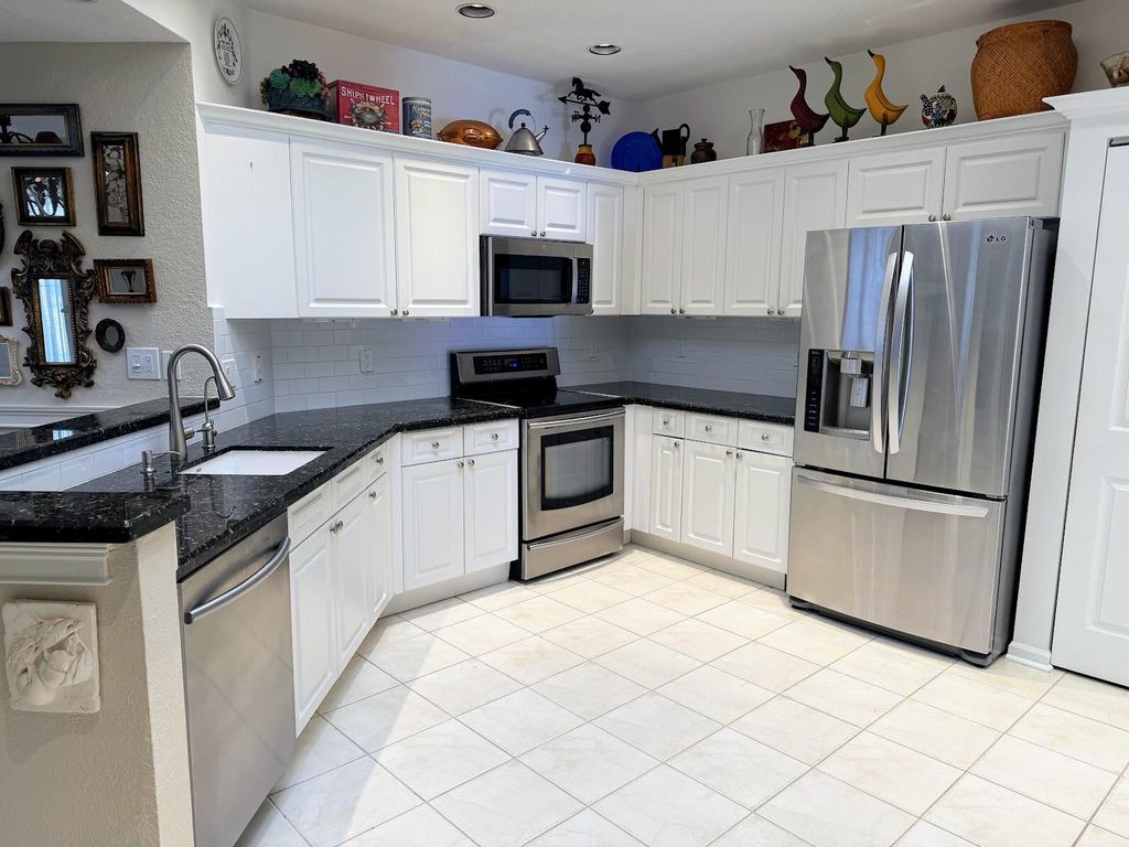 Photo of 12562 Crystal Pointe Drive #A, Boynton Beach, FL 33437 (MLS # R11165970)
