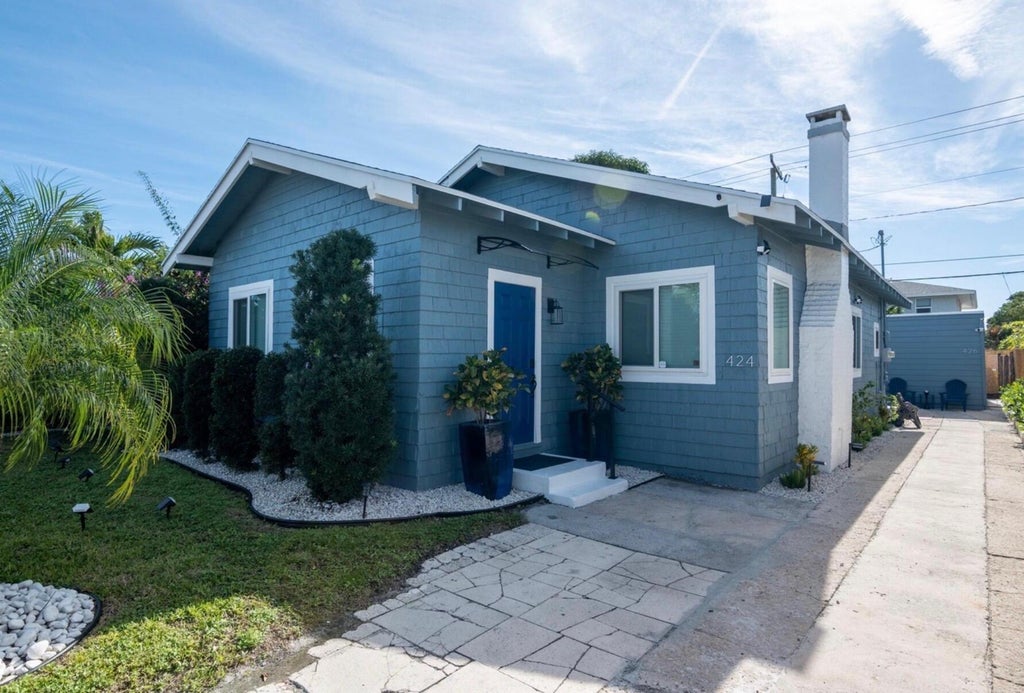 Photo of 424 Malverne Road, West Palm Beach, FL 33405 (MLS # B26067662)
