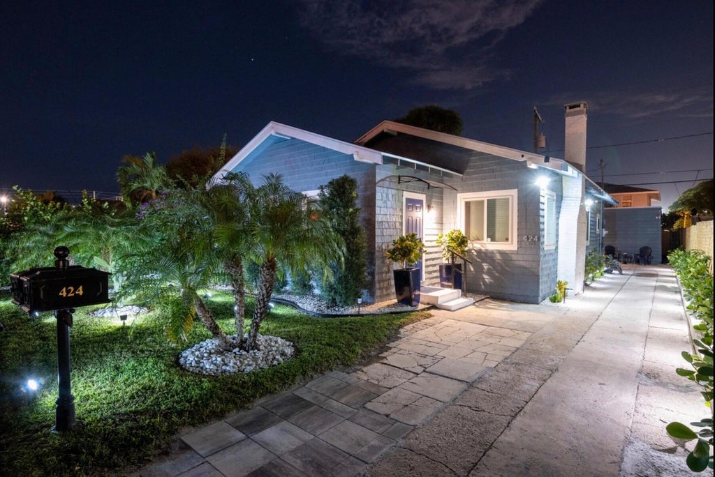 Photo of 424 Malverne Road, West Palm Beach, FL 33405 (MLS # B26067662)