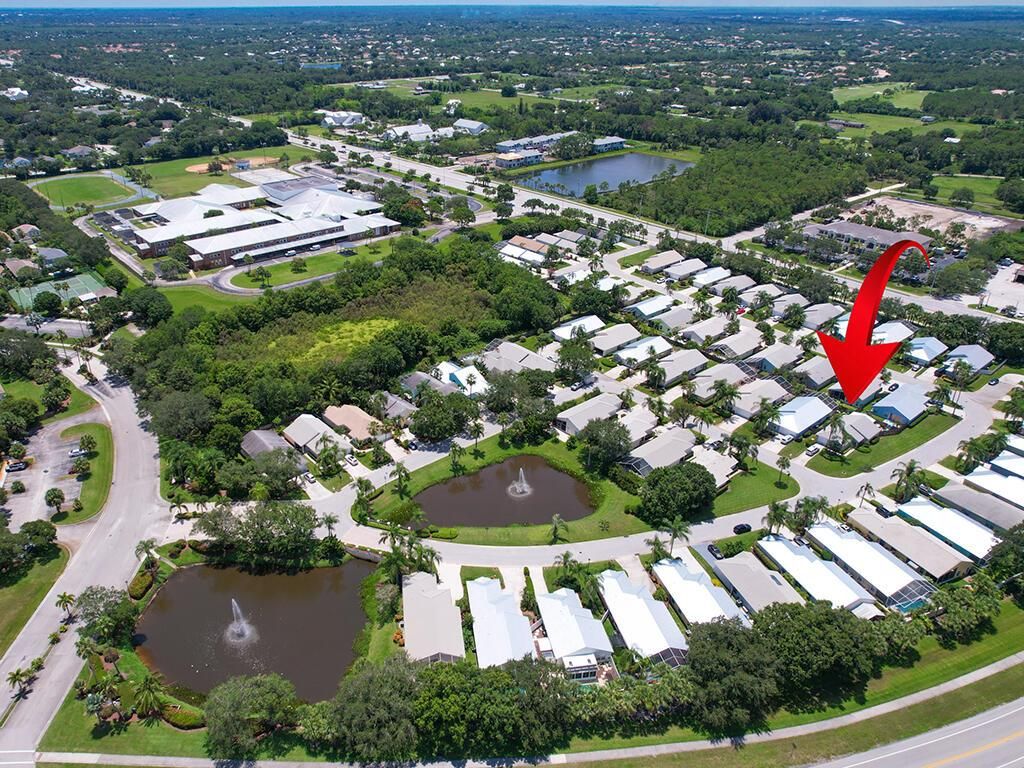 Photo of 3493 SW Pindo Palm Lane, Palm City, FL 34990 (MLS # R10902311)