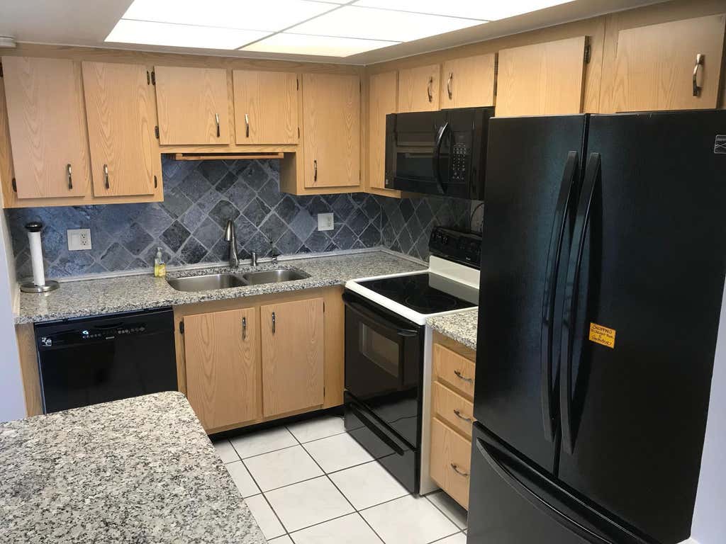 Photo of 4147 Oak Terrace Drive, Greenacres, FL 33463 (MLS # B26042921)