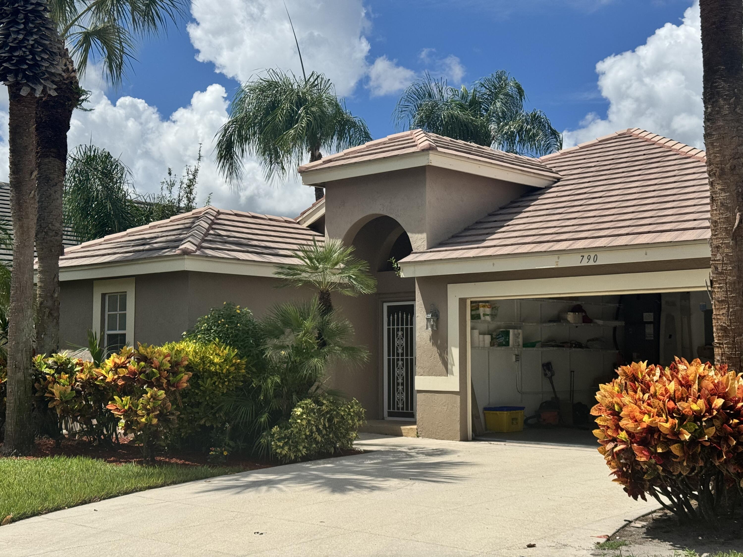 PHOTOS COMING SOON! Beautiful 4-bedroom, 3-bath single-family home in the heart of Delray Beach with high ceilings, 2-car garage, and courtyard with room for a pool. Detached mother-in-law suite, connected only by the roof, features a private entrance, walk-in closet, and full bath. Set on a cul-de-sac in an intimate gated community with low HOA that includes full-service lawn care. Close to the community pool, just 1 mile to I-95, 25 minutes to PBI Airport, and minutes from shops and restaurants.